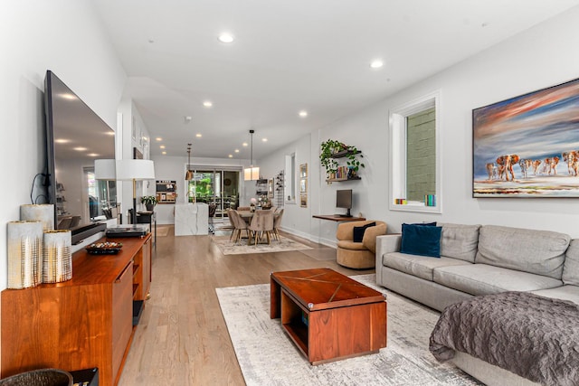 1410 N Greenview Ave Unit 1, Chicago, IL 60642 - living area featuring light wood-style flooring and recessed lighting