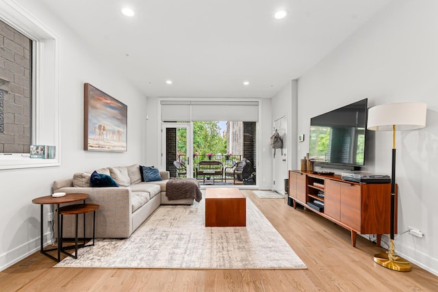 1410 N Greenview Ave Unit 1, Chicago, IL 60642 - living room with light wood-style floors and recessed lighting