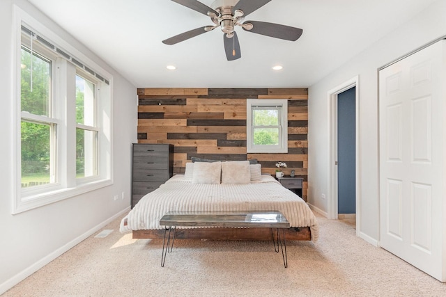 1237 Fox River Dr, Algonquin, IL 60102 - carpeted bedroom featuring multiple windows, wooden walls, recessed lighting, and ceiling fan