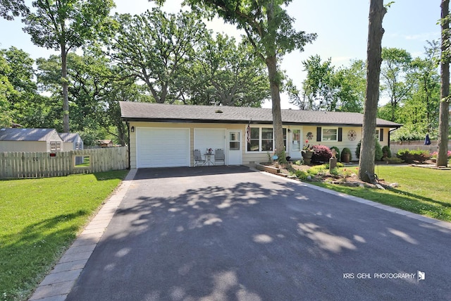38159 N Geraghty Ave, Beach Park, IL 60087 - ranch-style house featuring driveway and an attached garage