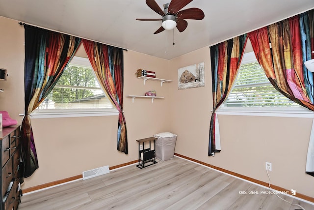 38159 N Geraghty Ave, Beach Park, IL 60087 - unfurnished room with a ceiling fan and light wood-style flooring