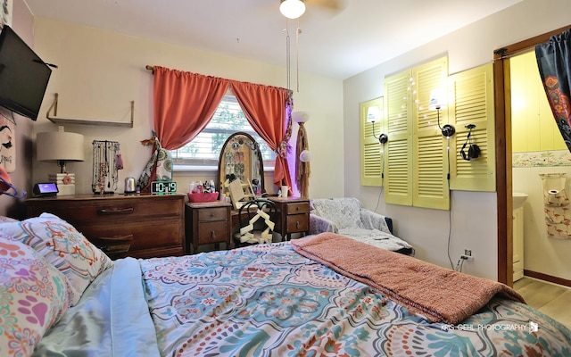 38159 N Geraghty Ave, Beach Park, IL 60087 - bedroom with wood finished floors, ensuite bath, and ceiling fan