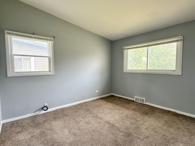 1133 Parkview Ave, Chicago Heights, IL 60411 - carpeted empty room with baseboards