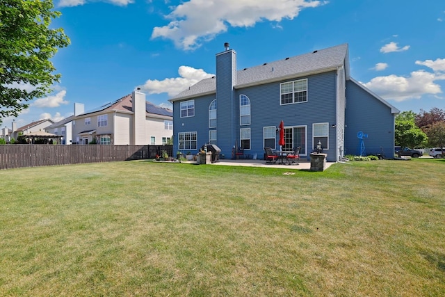 12820 Tipperary Ln, Plainfield, IL 60585 - rear view of property with a patio and a chimney