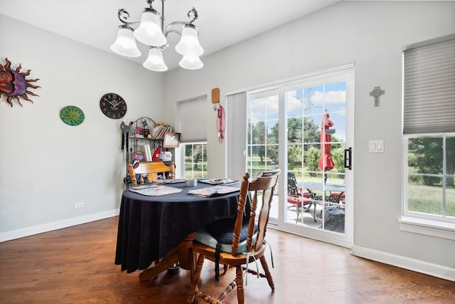 12820 Tipperary Ln, Plainfield, IL 60585 - dining area featuring a chandelier and wood finished floors