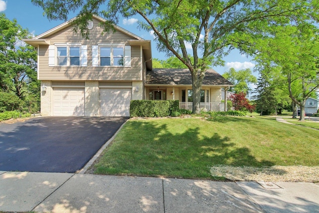 3760 N Alder Dr, Hoffman Estates, IL 60192 - view of front facade with driveway, brick siding, an attached garage, a front yard, and a porch