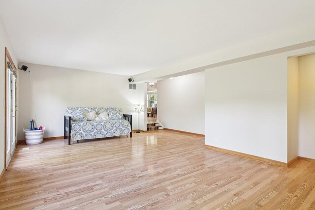 3760 N Alder Dr, Hoffman Estates, IL 60192 - living room with light wood-style flooring and stairs