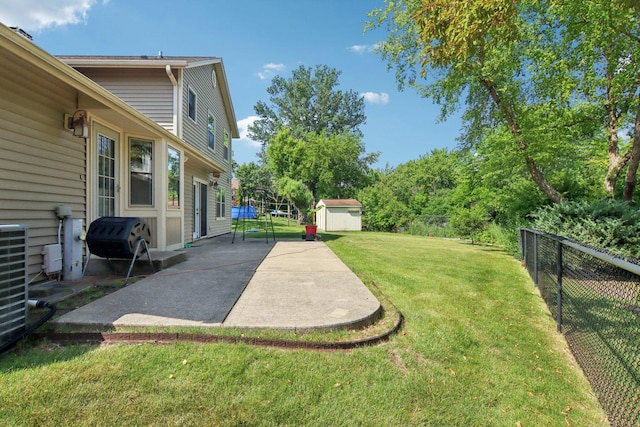 3760 N Alder Dr, Hoffman Estates, IL 60192 - fenced backyard featuring a patio area and a storage unit