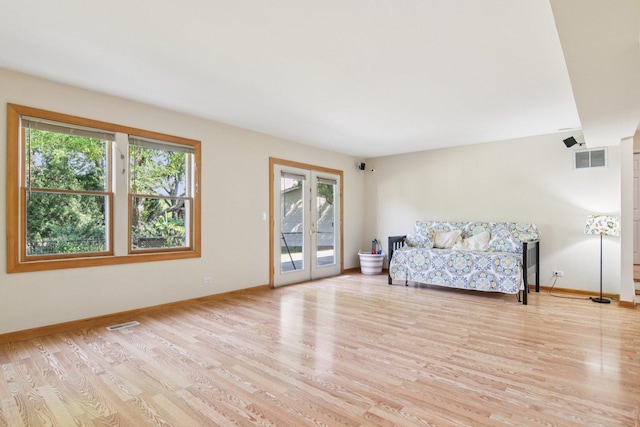 3760 N Alder Dr, Hoffman Estates, IL 60192 - sitting room featuring healthy amount of natural light, light wood-style floors, and french doors