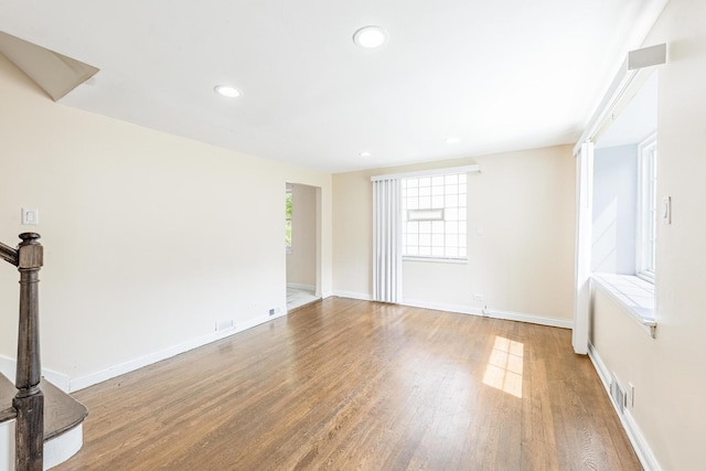 9626 S Oglesby Ave, Chicago, IL 60617 - spare room with wood finished floors and recessed lighting