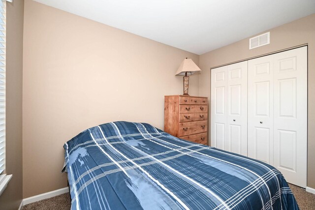 39735 N Paris Dr, Beach Park, IL 60083 - bedroom featuring carpet floors, baseboards, and a closet
