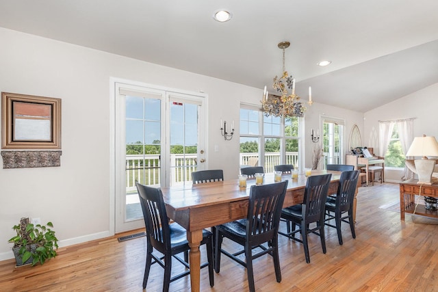 5284 Harvey Rd, Caledonia, IL 61011 - dining room featuring a chandelier, light wood-type flooring, vaulted ceiling, and recessed lighting