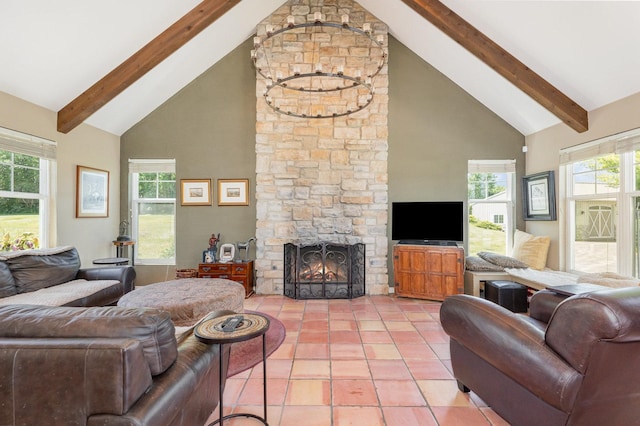 5284 Harvey Rd, Caledonia, IL 61011 - living area with high vaulted ceiling, a stone fireplace, beamed ceiling, and light tile patterned floors