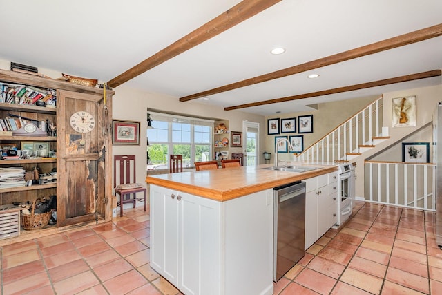5284 Harvey Rd, Caledonia, IL 61011 - kitchen with stainless steel dishwasher, beam ceiling, white cabinetry, recessed lighting, and white electric range