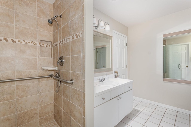 5284 Harvey Rd, Caledonia, IL 61011 - bathroom featuring tiled shower, vanity, and tile patterned floors