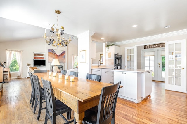 5284 Harvey Rd, Caledonia, IL 61011 - dining room featuring a chandelier, french doors, light wood finished floors, crown molding, and recessed lighting