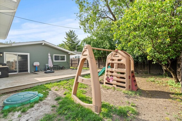 427 Cedarcrest Dr, Streamwood, IL 60107 - view of jungle gym with a fenced backyard and a wooden deck