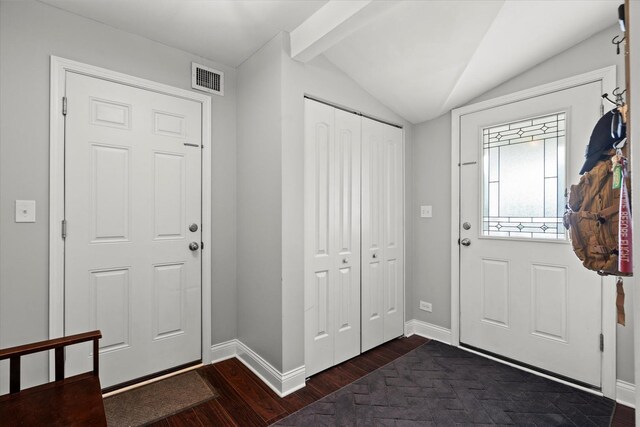 427 Cedarcrest Dr, Streamwood, IL 60107 - foyer with dark wood-type flooring, lofted ceiling, and baseboards