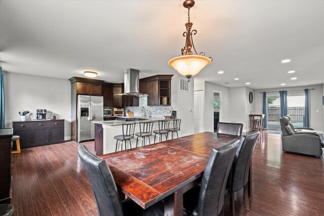 427 Cedarcrest Dr, Streamwood, IL 60107 - dining room with dark wood-type flooring and recessed lighting