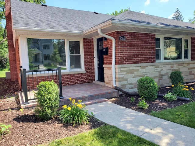 1308 Frances Pkwy, Park Ridge, IL 60068 - view of front of property with a shingled roof, stone siding, and brick siding