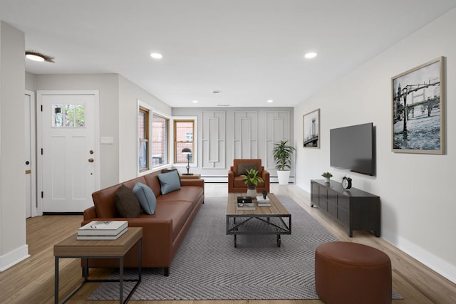 1308 Frances Pkwy, Park Ridge, IL 60068 - living area featuring wood finished floors, baseboard heating, and recessed lighting