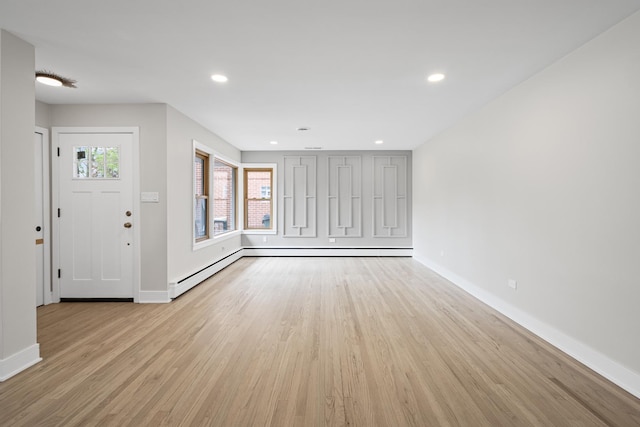 1308 Frances Pkwy, Park Ridge, IL 60068 - unfurnished living room with light wood finished floors and recessed lighting