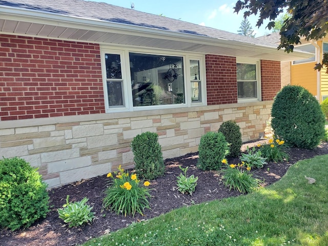 1308 Frances Pkwy, Park Ridge, IL 60068 - view of home's exterior with stone siding, roof with shingles, and brick siding