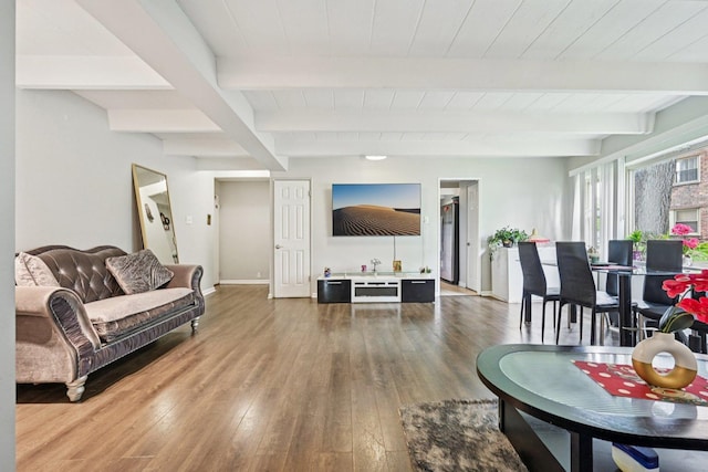 2142 W Rosemont Ave Unit 1A, Chicago, IL 60659 - living room featuring wood-type flooring and a wood ceiling with exposed beams