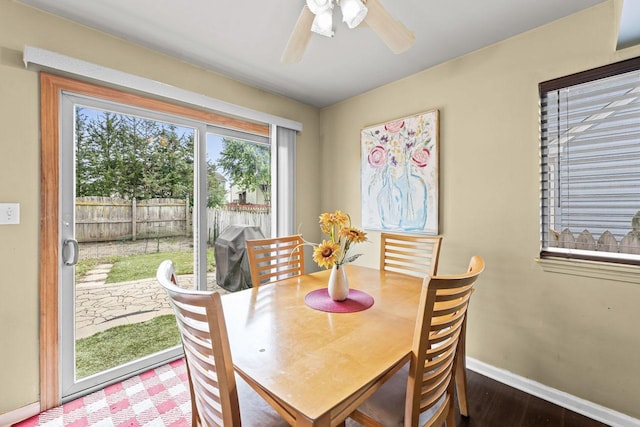 1861 Grosse Pointe Cir, Hanover Park, IL 60133 - dining area featuring ceiling fan and wood finished floors