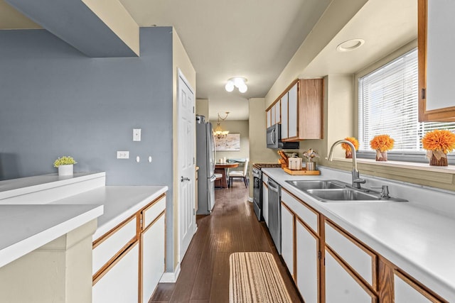 1861 Grosse Pointe Cir, Hanover Park, IL 60133 - kitchen with stainless steel appliances, light countertops, and dark wood finished floors