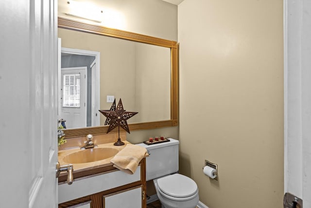 1861 Grosse Pointe Cir, Hanover Park, IL 60133 - half bathroom featuring toilet and vanity