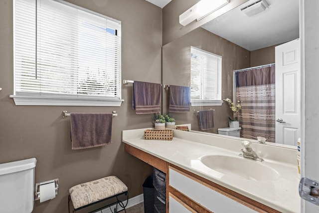 1861 Grosse Pointe Cir, Hanover Park, IL 60133 - full bathroom featuring plenty of natural light, vanity, and a shower with shower curtain