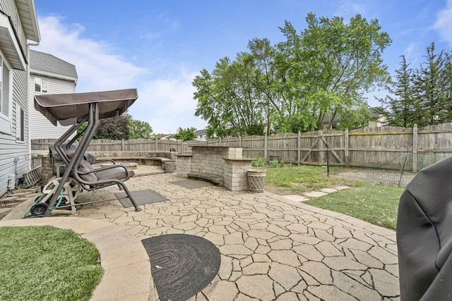 1861 Grosse Pointe Cir, Hanover Park, IL 60133 - fenced backyard with a patio area and area for grilling