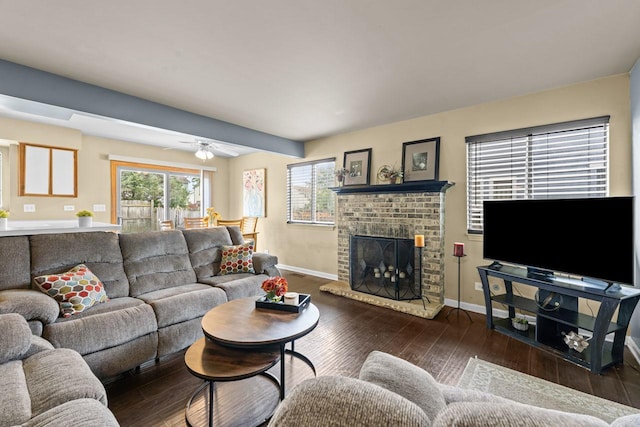 1861 Grosse Pointe Cir, Hanover Park, IL 60133 - living room with wood-type flooring, a brick fireplace, and a ceiling fan