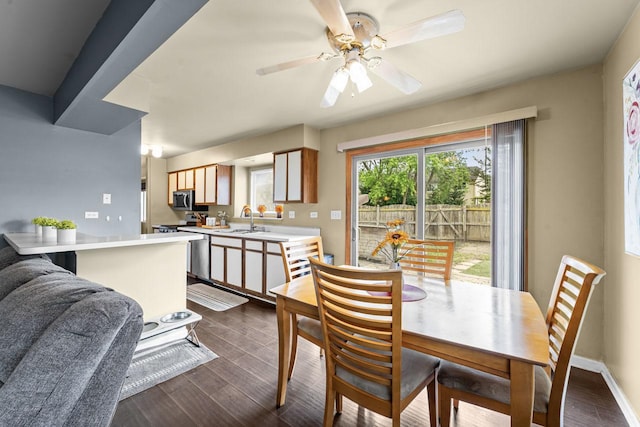 1861 Grosse Pointe Cir, Hanover Park, IL 60133 - dining room with dark wood finished floors and a ceiling fan