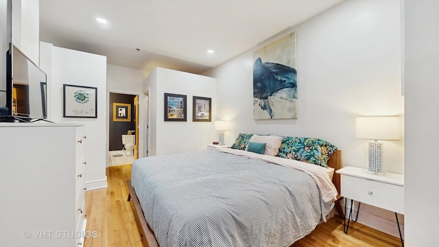 212 W Washington St Unit 1108, Chicago, IL 60606 - bedroom with light wood-type flooring and recessed lighting