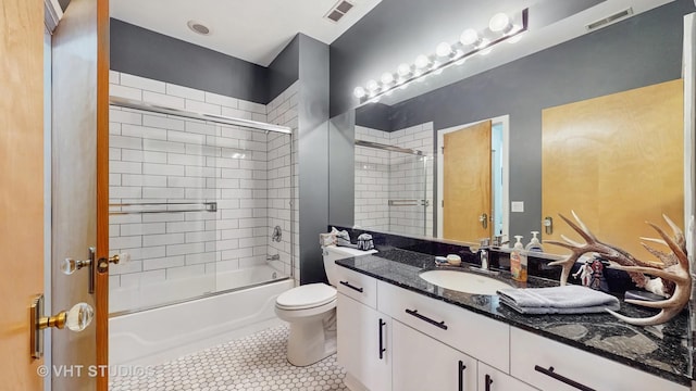 212 W Washington St Unit 1108, Chicago, IL 60606 - bathroom with vanity, tile patterned flooring, and enclosed tub / shower combo