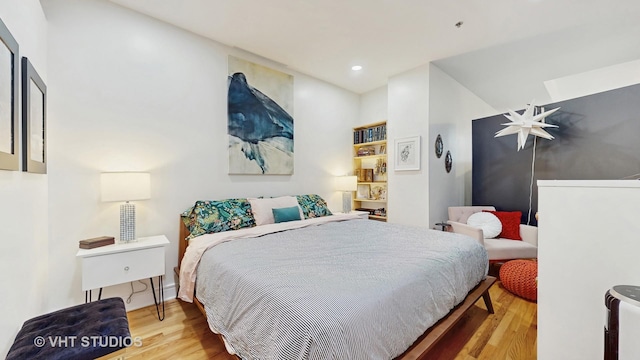212 W Washington St Unit 1108, Chicago, IL 60606 - bedroom with wood finished floors and recessed lighting