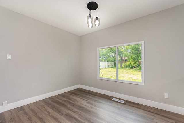 16632 Sawyer Ave, Markham, IL 60428 - unfurnished room with dark wood-type flooring