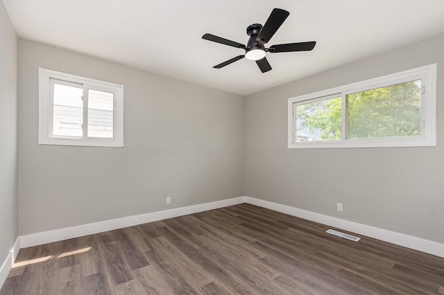 16632 Sawyer Ave, Markham, IL 60428 - spare room featuring dark wood-style flooring and a ceiling fan