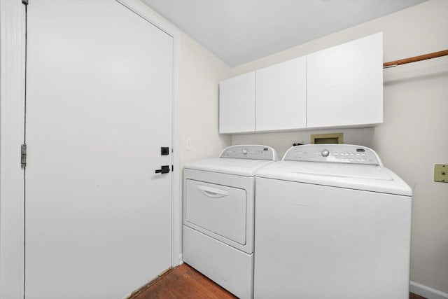 881 Dandridge Ct, Elgin, IL 60120 - laundry area with separate washer and dryer, cabinet space, and dark wood-type flooring