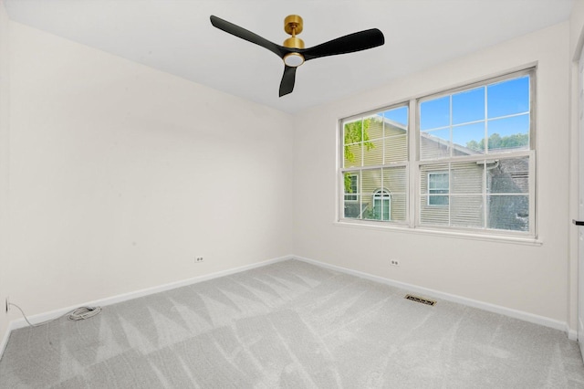 881 Dandridge Ct, Elgin, IL 60120 - empty room featuring light carpet and a ceiling fan
