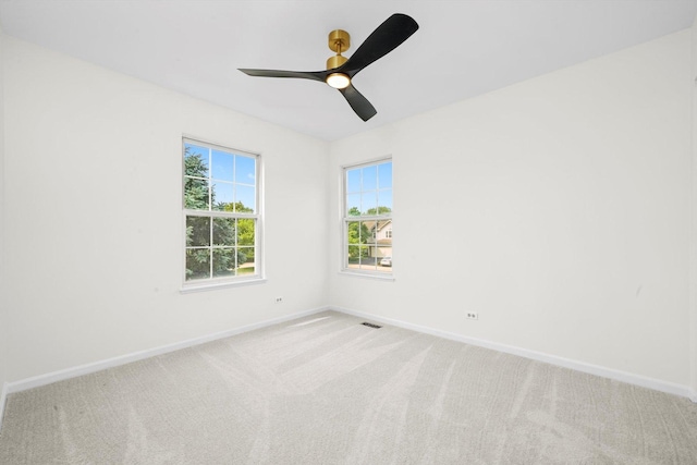881 Dandridge Ct, Elgin, IL 60120 - unfurnished room with light colored carpet and a ceiling fan