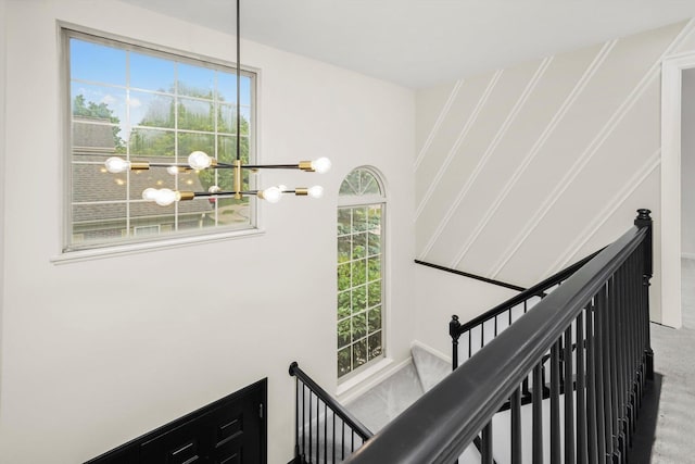 881 Dandridge Ct, Elgin, IL 60120 - stairs featuring a chandelier