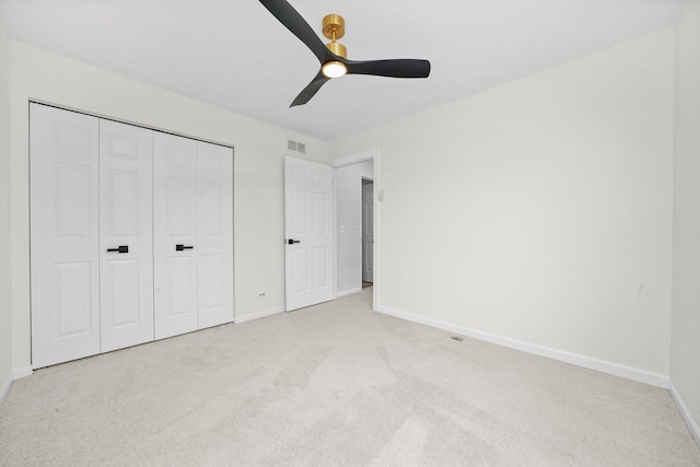 881 Dandridge Ct, Elgin, IL 60120 - unfurnished bedroom with light carpet, a closet, and ceiling fan