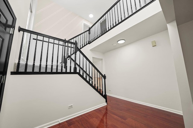 881 Dandridge Ct, Elgin, IL 60120 - stairway with wood finished floors, a high ceiling, and recessed lighting