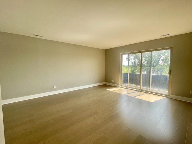 4125 N Keystone Ave Unit 605, Chicago, IL 60641 - empty room featuring wood finished floors and baseboards