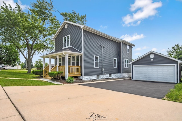 223 E 20th Ct, Lockport, IL 60441 - view of front of home with covered porch, a garage, and a front lawn