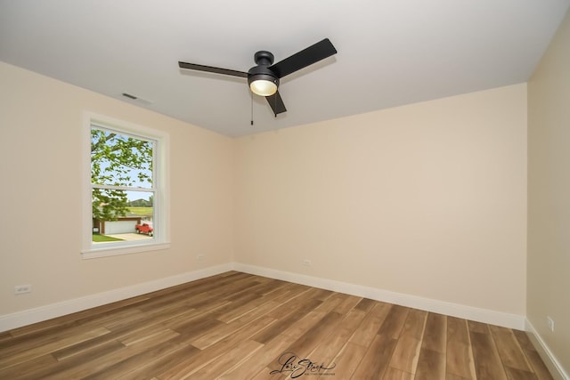 223 E 20th Ct, Lockport, IL 60441 - unfurnished room featuring ceiling fan and light wood-type flooring