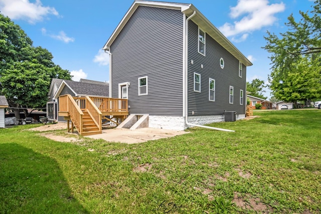 223 E 20th Ct, Lockport, IL 60441 - rear view of property with a deck and a lawn